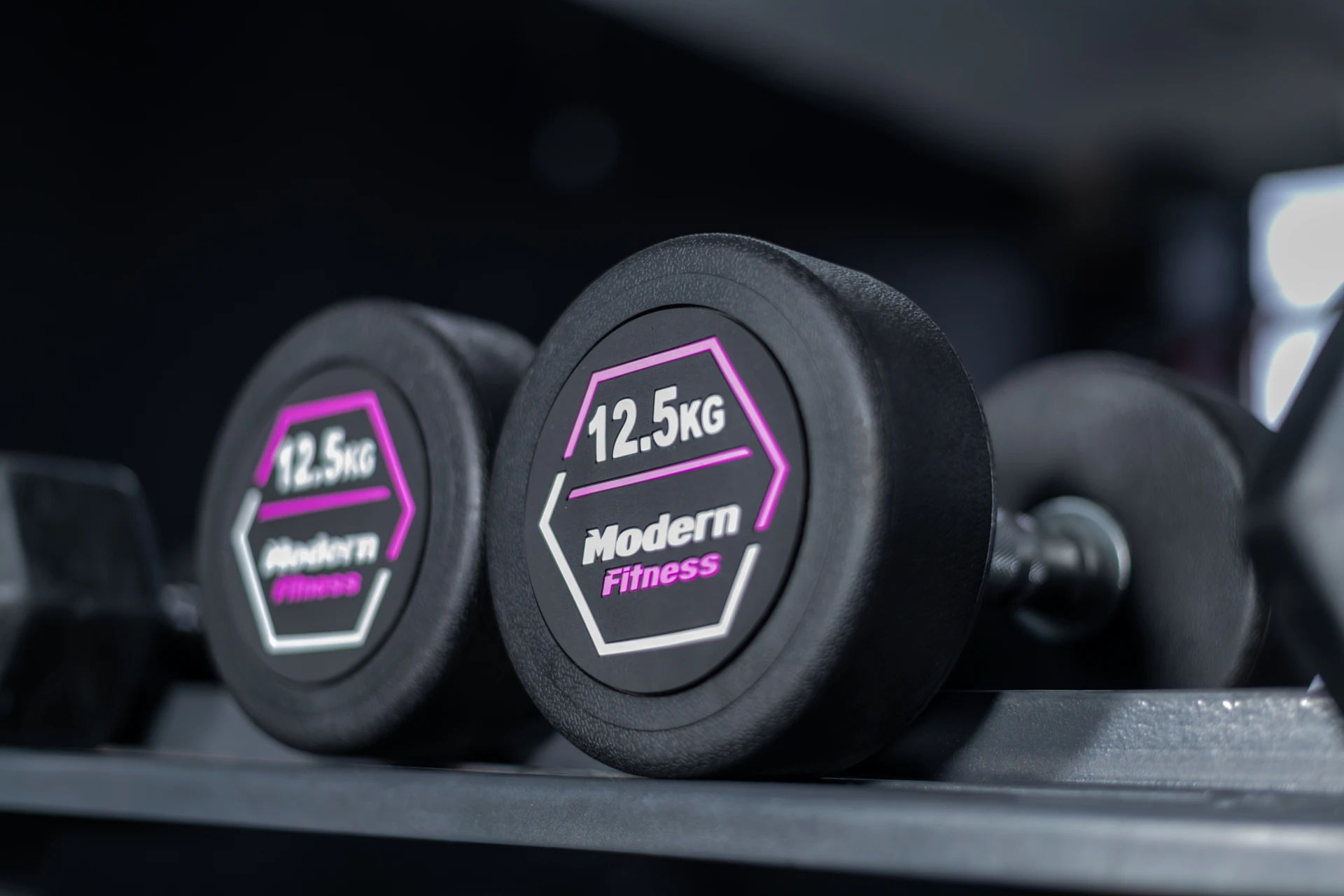 Product Photos 2–42 Dumbbell pairs for home use- picture of the Rubber Dumbbells from Modern Fitness